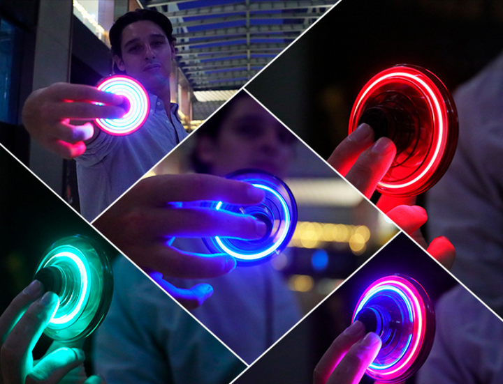 Świecąca latająca kula spinner w dłoni