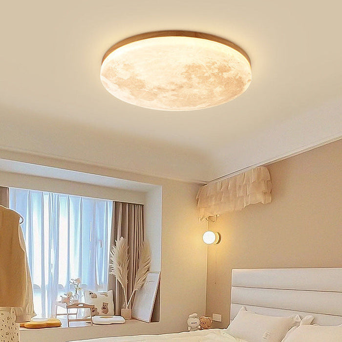 Elegancka lampa sufitowa LED inspirowana Księżycem